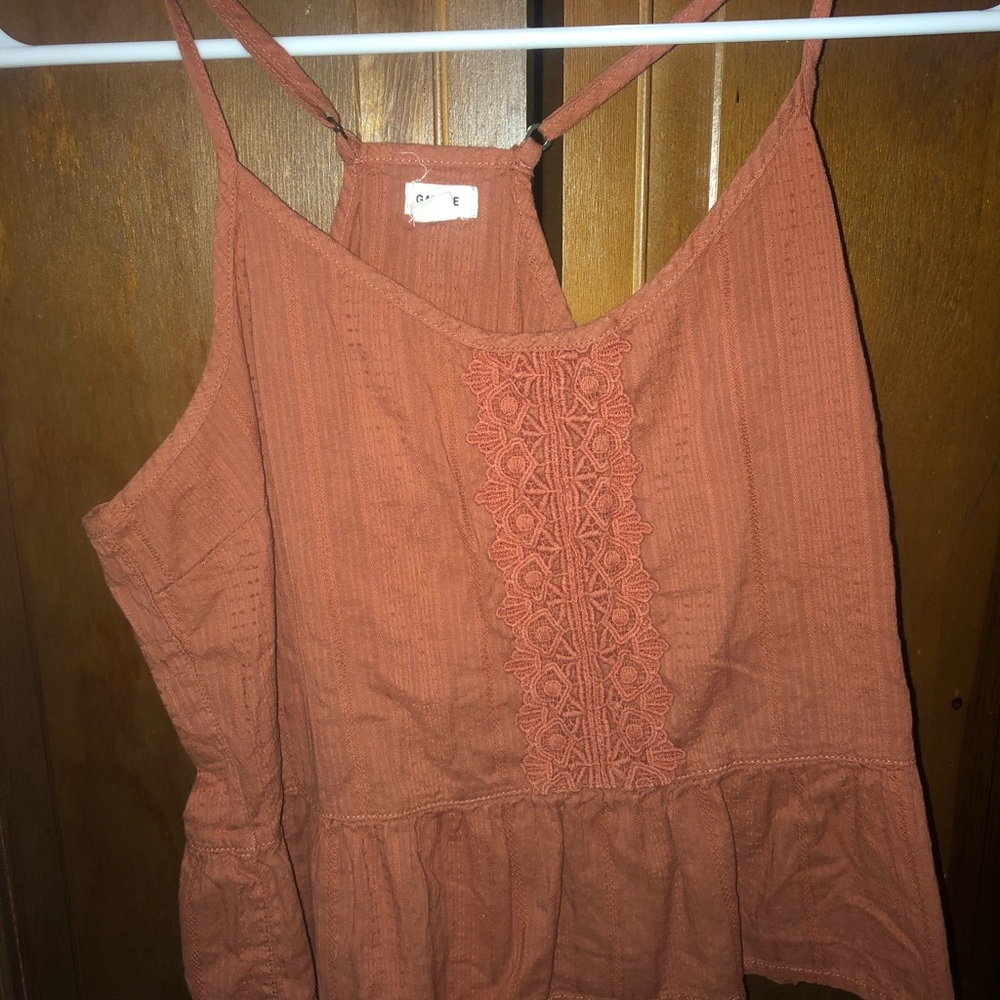 Garage Burnt orange tank